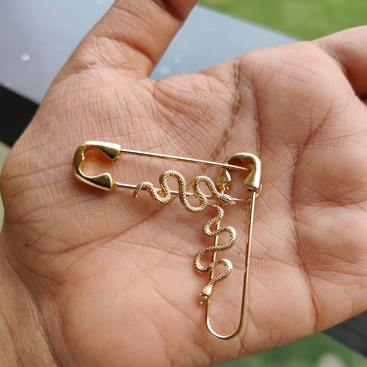 Ira Dubey styled- Serpent safety pins