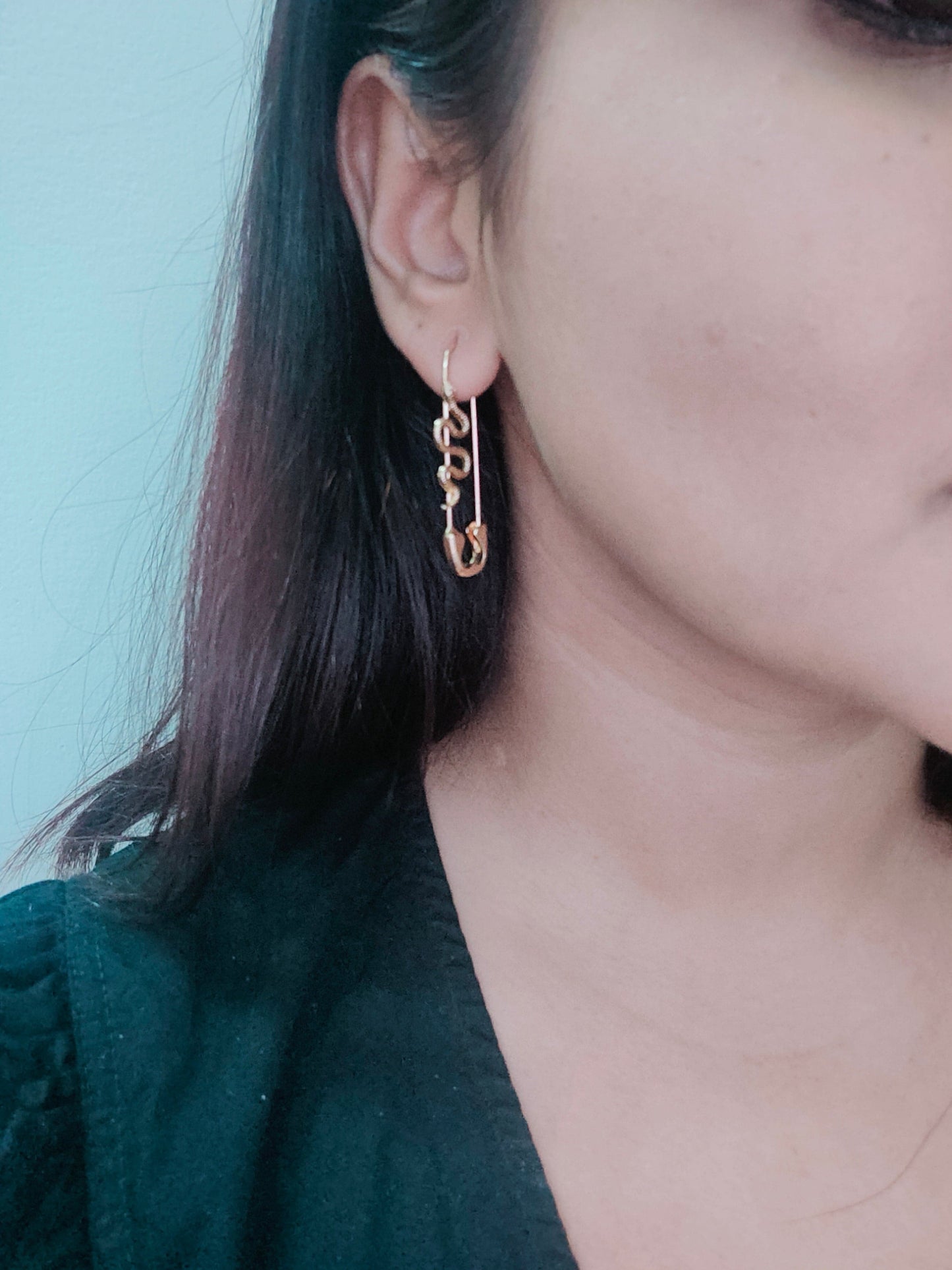 Ira Dubey styled- Serpent safety pins